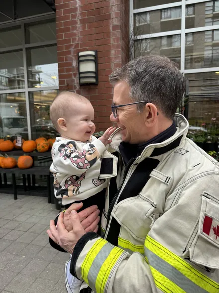 A young resident meets Port Moody Fire Rescue.