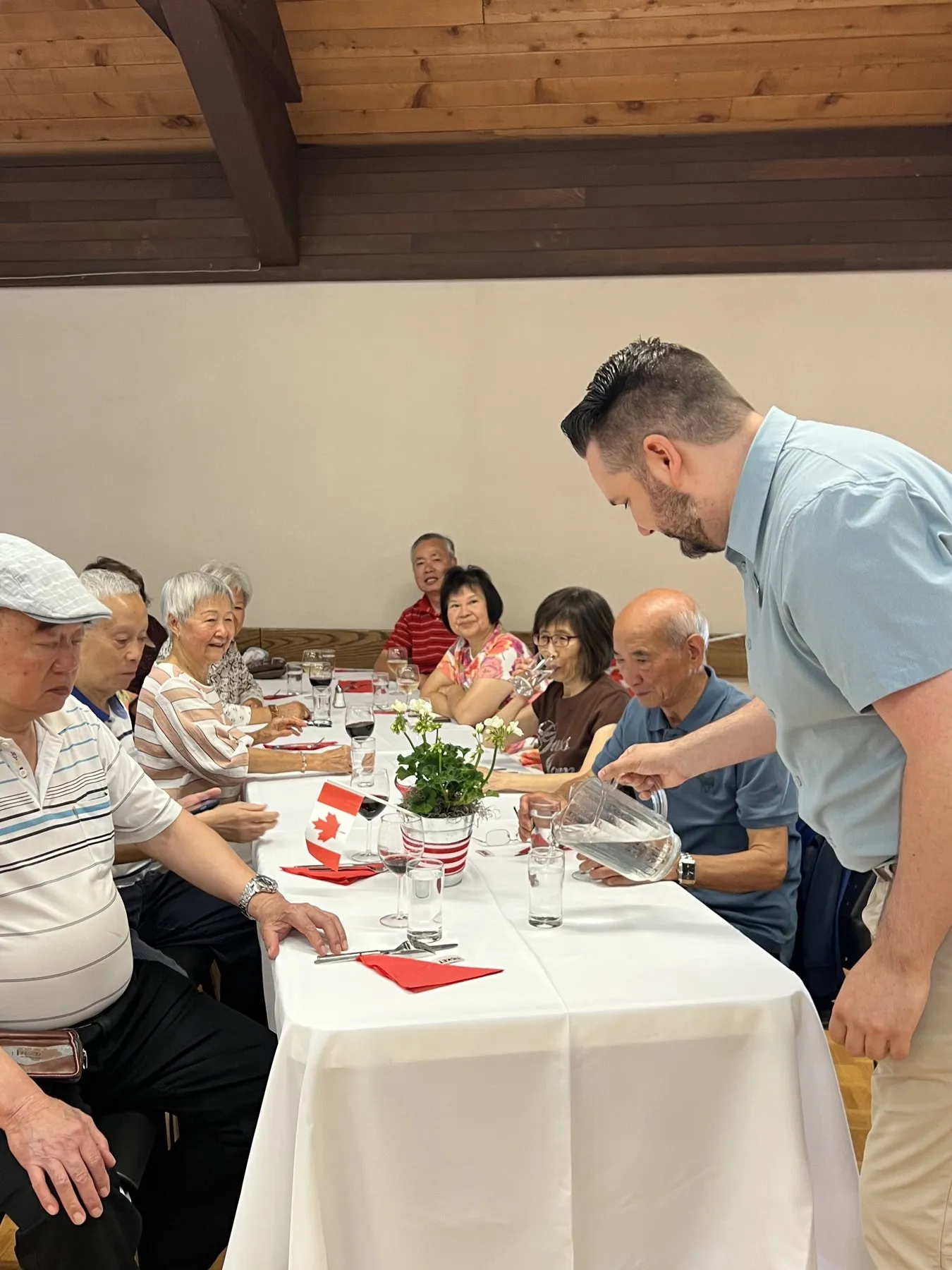 Callan Morrison serving dinner at a Port Moody seniors' event.