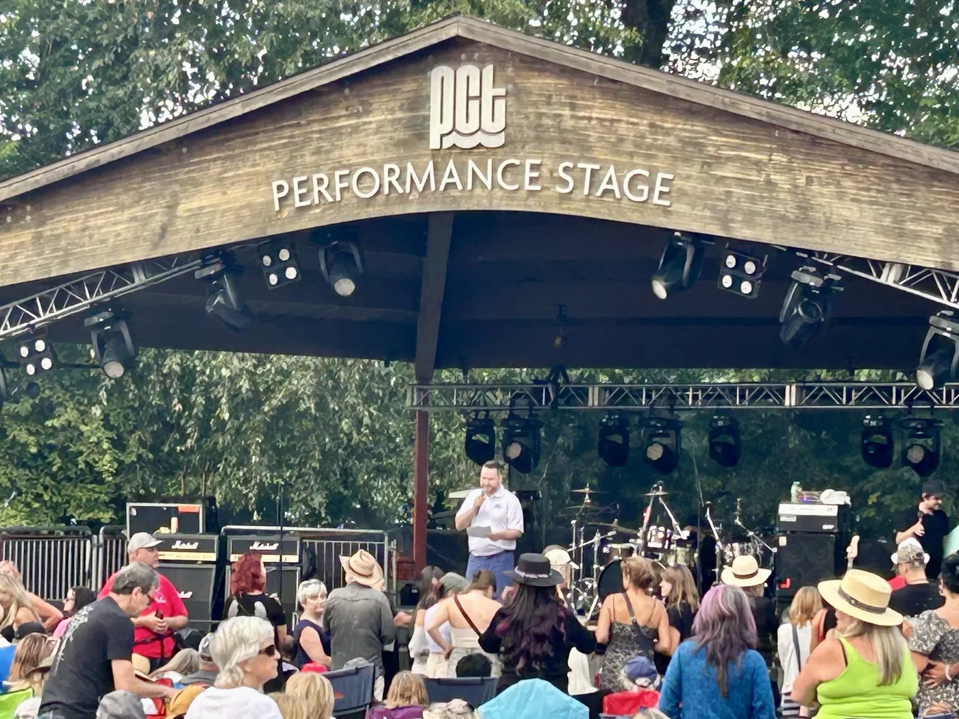 A summer concert crowd at the Port Moody performance stage.